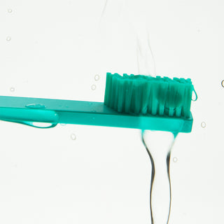 Slim Turquoise Blue Silver Medium Toothbrush